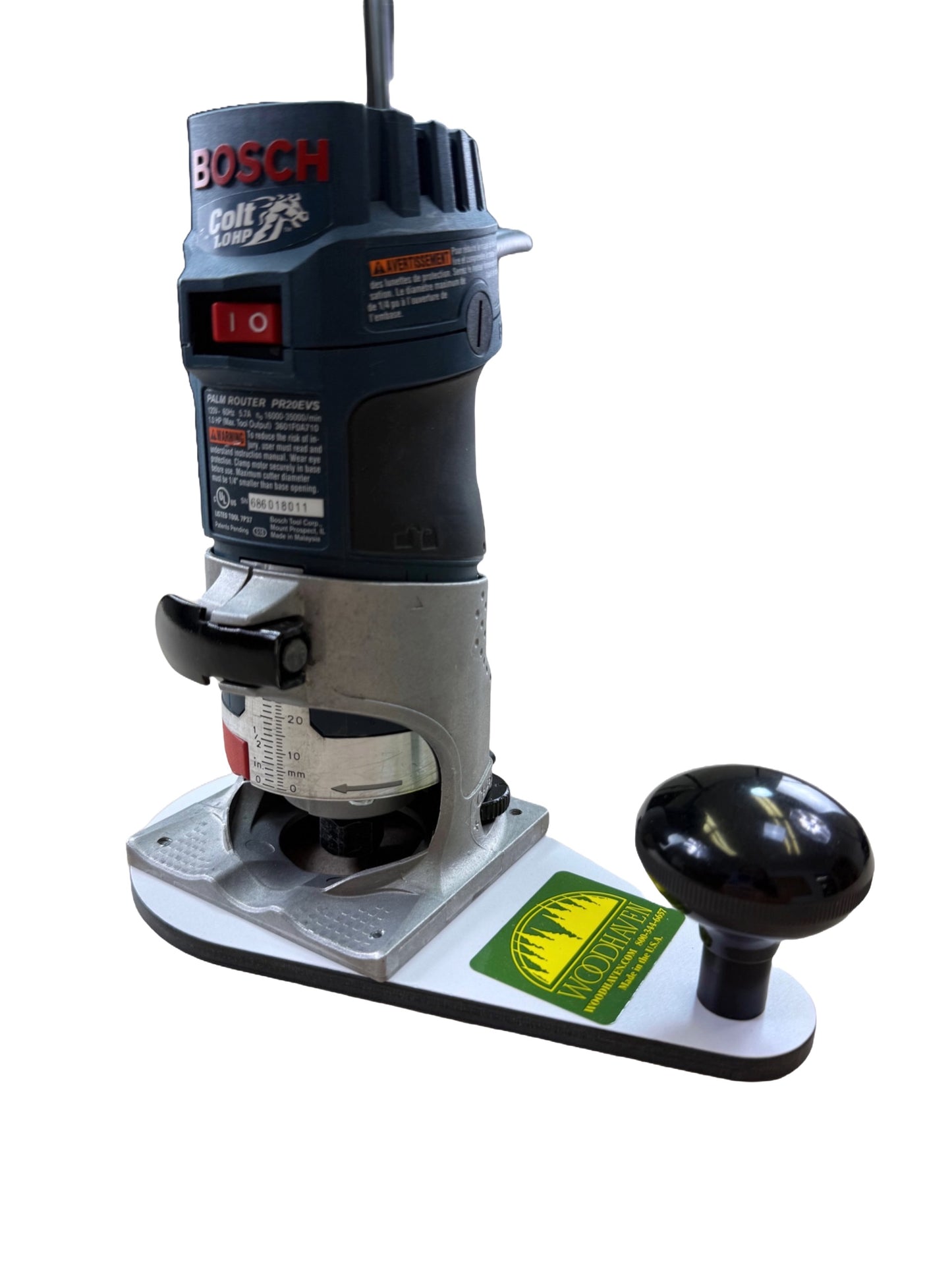Bosch router on a white offset baseplate