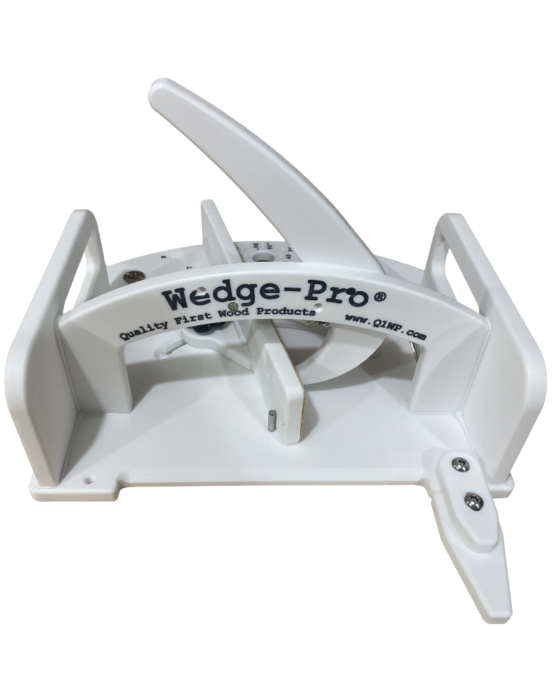 A white segmented circle cutting sled with the Wedge-Pro brand name on it.