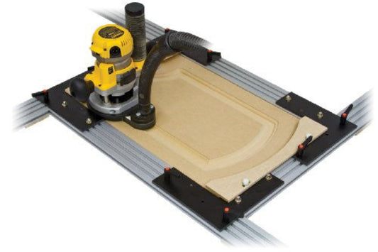 Woodhaven 5380K MDF Door Kit showing router following inside of aluminum frame on MDF panel