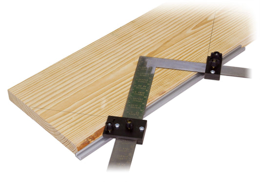 Stair layout tool laying on a board