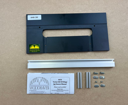 Woodhaven 640-3D Tectus 640 3D Hinge kit components laid out. Including a black hinge template, aluminum rails, mounting hardware, and an owner's manual.