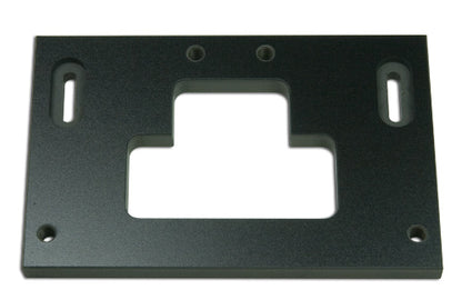 Strike plate jig positioned on door jamb showing template alignment
